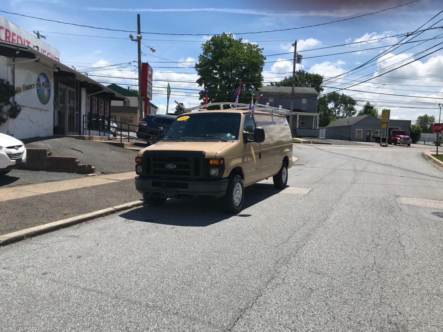 2011 Tan /Gray Ford E-Series Van E250 (1FTNE2EW5BD) with an 4.8 V8 engine, Automatic transmission, located at 577 Chester Pike, Prospect Park, PA, 19076, (610) 237-1015, 39.886154, -75.302338 - Photo#1